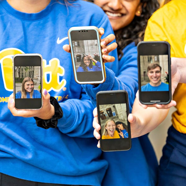 Students holding cell phones