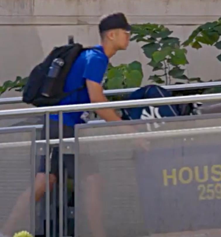 Student pushing cart during arrival weekend