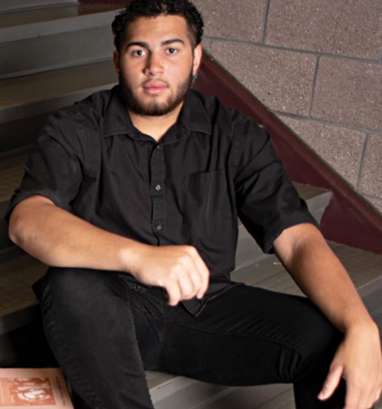 Male sitting on stairs