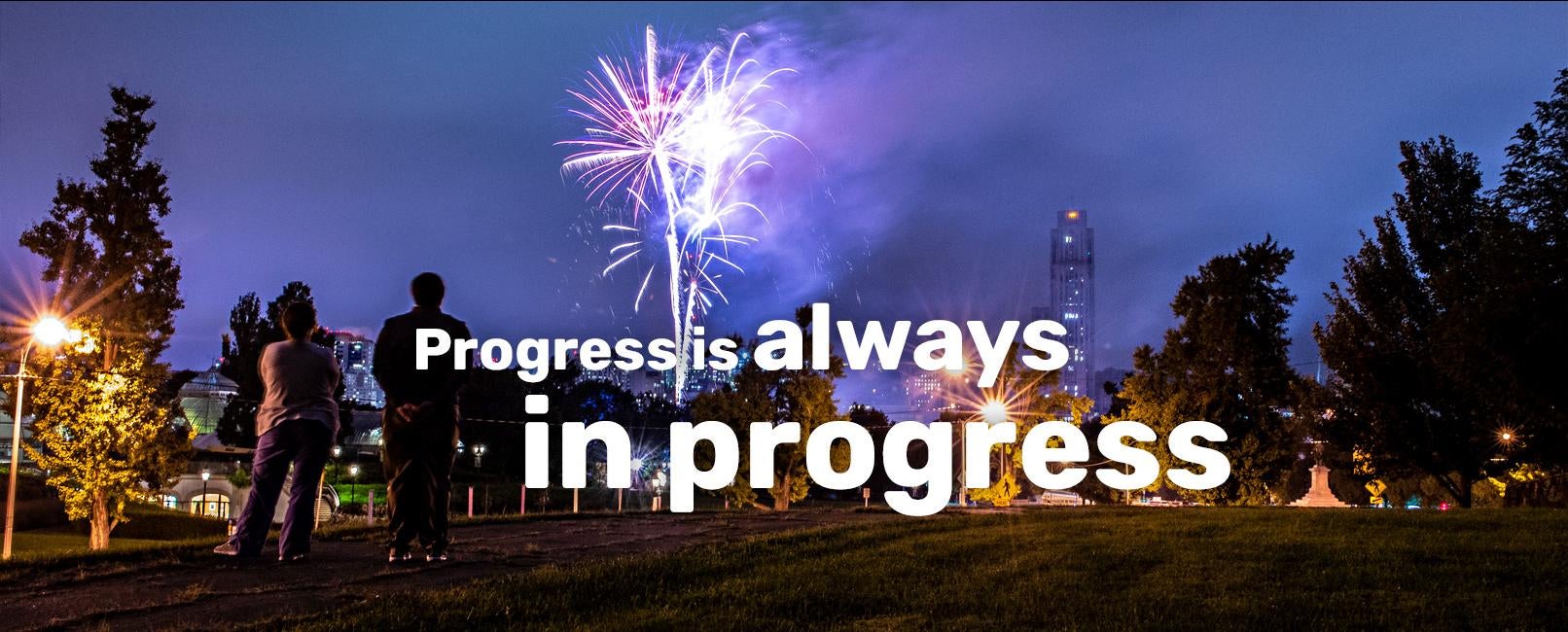 Fireworks with Cathedral in background: Progress is always in progress text over image