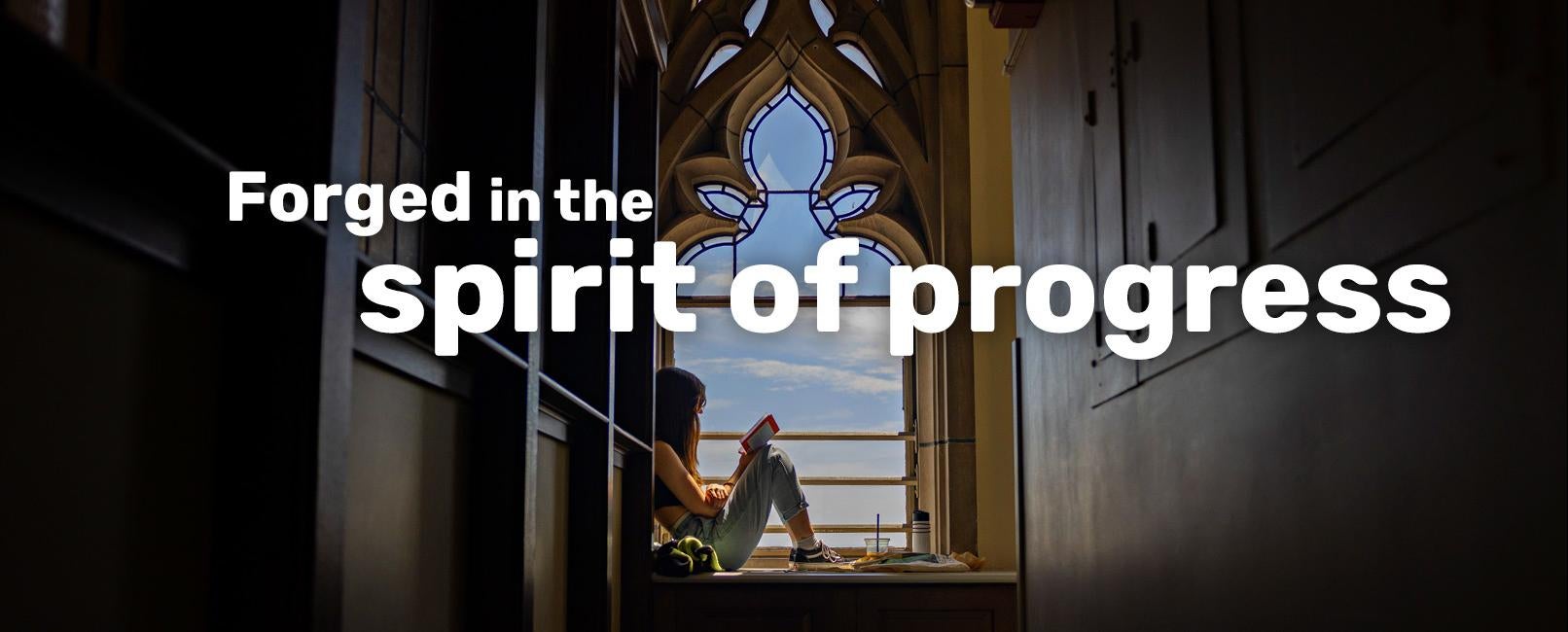 Cathedral window: Forged in the spirit of progress text over image